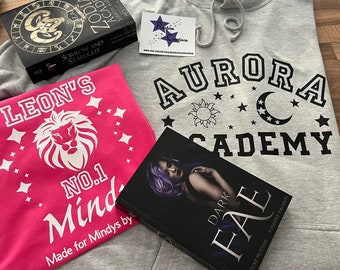 Hoodie + T-shirt Aurora Academy Hoodie & choice of T-shirt *Officially licensed merchandise* Caroline Peckham and Susanne Valenti