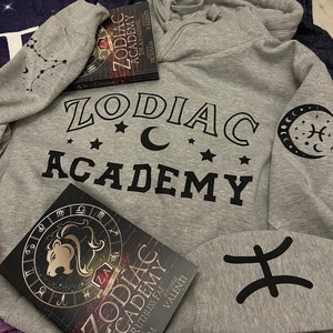 2 set. Zodiac Academy Hoodie & choice of T-shirt *Officially licensed merchandise* Caroline Peckham and Susanne Valenti.
