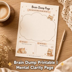 May include: A cream-coloured Brain Dump Page printable featuring a large central cloud-shaped writing area, two smaller sections labelled Sort Later and Park This Idea, and illustrations of small brown cats wearing glasses.