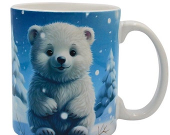 May include: A white ceramic mug with a blue background and a white polar bear cub with a cute expression. The bear is standing in a snowy winter scene with pine trees.