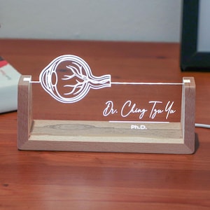 Placa de identificação personalizada para mesa de ótica com LED: decoração para escritório de cuidados com os olhos