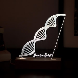 3D illusion lamp featuring a detailed DNA double helix design, illuminated in a white tone, personalized with a name, perfect as a unique and thoughtful gift for geneticists, scientists, or medical professionals specializing in human genome research