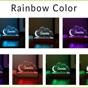 Puede incluir: Una luz nocturna en forma de nube con el nombre "Clementine" inscrito en ella. La luz se muestra en varios colores, incluidos azul, morado, rojo, verde y turquesa.