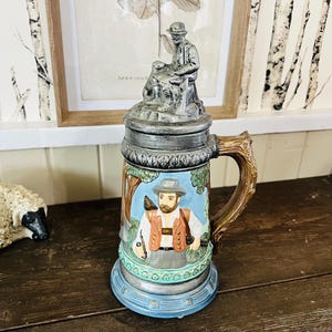 Unique Vintage Large Ceramic 3D Hand-Painted Beer Stein Featuring a Hunter, a Dog, a Tree and a large Branch Handle