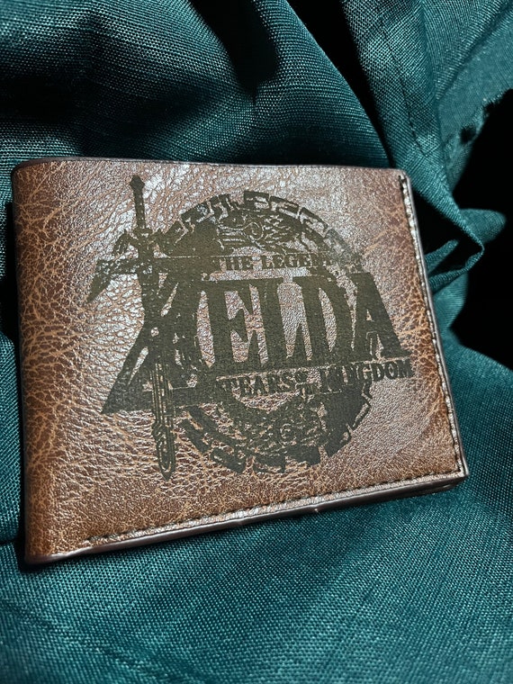 Engraved leather tears link kingdom wallet