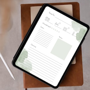 May include: A digital recipe template on a tablet with a green watercolor background. The template includes sections for the recipe name, ingredients, cooking time, and instructions.