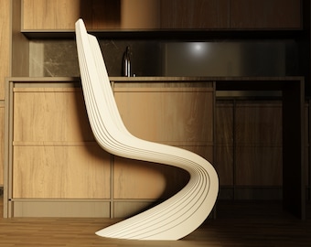 May include: A white, modern, curved chair with a wooden slat design sits in front of a kitchen counter with wooden cabinets.