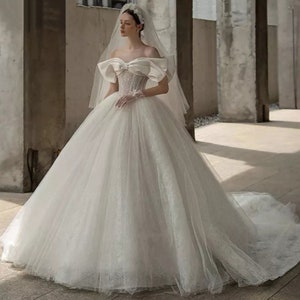 Ball Gown Luxury Lace Princess Wedding Dresses Off The Shoulder Big Bow Bridal Gowns Lace Up Back Court Train Bridal Dress