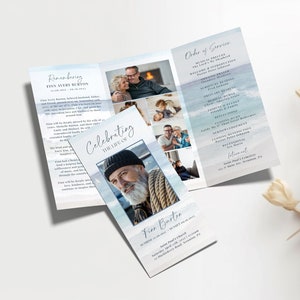 May include: A blue and white watercolour-style funeral order of service with a photograph of a man wearing a hat. The order of service includes details of the service, a remembrance of the deceased, and a celebration of their life. The text reads "Remembering Finn Avery Burton" and "Celebrating The Life Of Finn Burton".