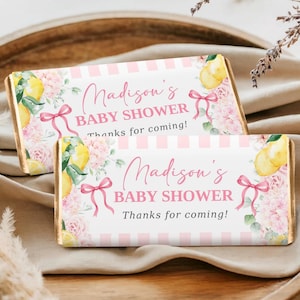 May include: A rustic wooden sign with the text "Welcome to our home" in white lettering. The sign has a distressed finish and a simple, inviting design, ideal for front door decor.