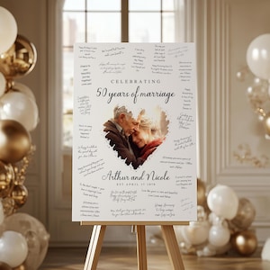 May include: A white sign on an easel celebrating a 50th wedding anniversary. The sign features a heart-shaped image of an embracing couple, surrounded by handwritten messages. The text reads "Celebrating 50 years of marriage" and "Arthur and Nicole, Est. April 17 1974."