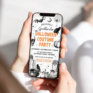 May include: A smartphone displays a Halloween party invitation. The invitation features a bat, spiderweb, black cat, skull, pumpkin, and other spooky illustrations. Text reads "Spooktacular Halloween Costume Party" with event details.