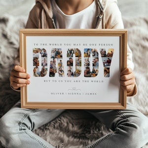 May include: A framed photo collage with the word "DADDY" spelled out using photos. The text below reads "To the world you may be one person, but to us you are the world." The names Oliver, Sienna, and James are listed below the text.