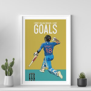 May include: A yellow and teal poster with a graphic of a cricket player in a blue uniform with the number 18 on the back. The text on the poster reads "I don't follow dreams, I hunt goals".