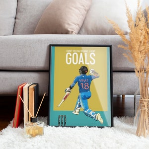 May include: A motivational poster featuring a cricket player in a blue uniform with the number 18 on the back. The poster has a yellow background with the text "I don't follow dreams I hunt goals" and the player's name "Virat" printed on the uniform.
