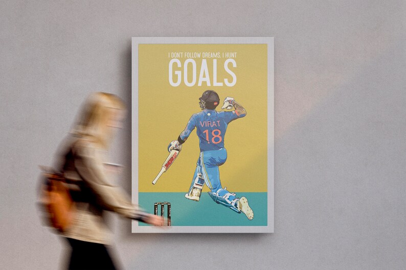 May include: A yellow and teal poster with a cartoon illustration of a cricket player in a blue uniform with the number 18 on the back. The text on the poster reads "I don't follow dreams, I hunt goals".