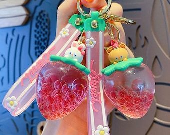 Porte-clés Kawaii Liquid Strawberry - Porte-clés Boba rose mobile - Lapin et ours - Forme de fraise sucrée avec bracelet en silicone - Mignon, joli, Y2K