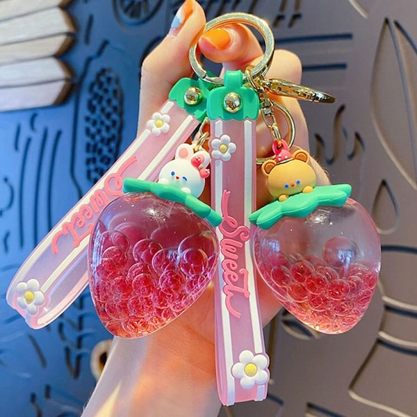 Porte-clés Kawaii Liquid Strawberry - Porte-clés Boba rose mobile - Lapin et ours - Forme de fraise sucrée avec bracelet en silicone - Mignon, joli, Y2K