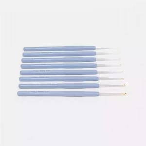 A set of six crochet hooks in various shades of blue, arranged in a row.