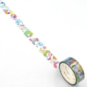 A roll of colorful patterned tape with various cartoon-like characters and designs on it, placed on a white surface.