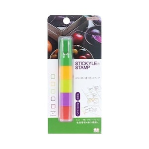 May include: A multi-colored STICKYLE STAMP in a clear plastic package. The stamp is divided into sections of green, yellow, lime green, purple, and red. The packaging includes text and illustrations, with the brand name "BANDAI NAMCO" at the top.