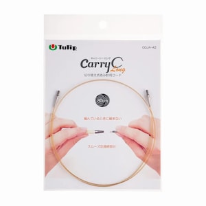 May include: A package of Tulip Carry C Long knitting needles. The package displays the product name, a diagram of the needle, and the text "80cm". The needle is shown in a clear plastic package.