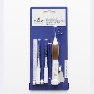 May include: A blue package containing a DMC Punch Needle Pen set. The set includes a white and brown punch needle pen, and three needle attachments. The package has Japanese text and the words "QUALITY PRODUCT".