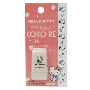 May include: A Hello Kitty Coro-Re stamp in a pink and white package. The stamp is rectangular and features the Hello Kitty character. The packaging includes text in Japanese and English, along with daisy and Hello Kitty graphics.
