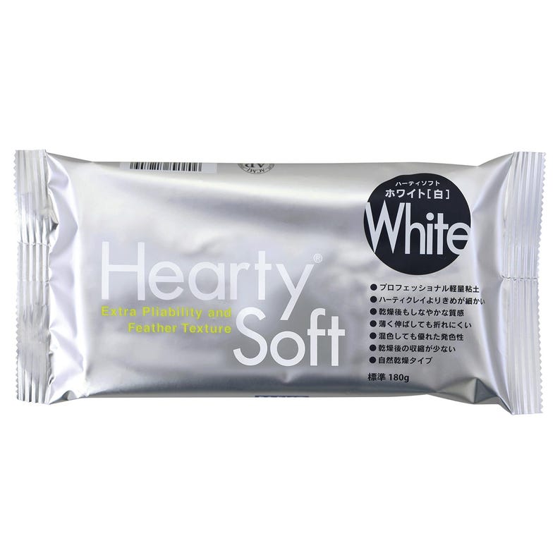 A silver-colored package of "Hearty Soft" yogurt, which is described as a "Extra Pulence and Feathery Texture".