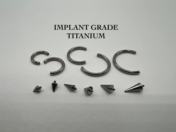 Implant Grade Titanium Horseshoe Barbell with Spikes Implant Grade Titanium Horseshoe Barbell with Spikes