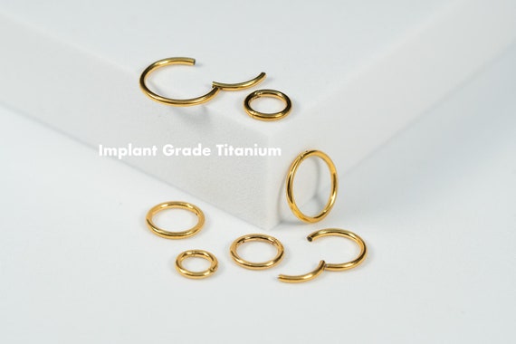 Implant Grade Titanium White Bezel Opal Septum Cartilage Daith Hinged Clicker Implant Grade Titanium White Bezel Opal Septum Cartilage Daith Hinged Clicker