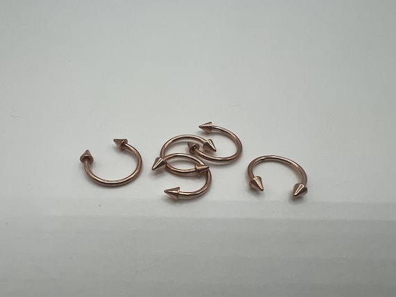 Gold Plated Surgical Steel Circular Horseshoe Tragus Cartilage Barbell with Spike Ends Gold Plated Surgical Steel Circular Horseshoe Tragus Cartilage Barbell with Spike Ends