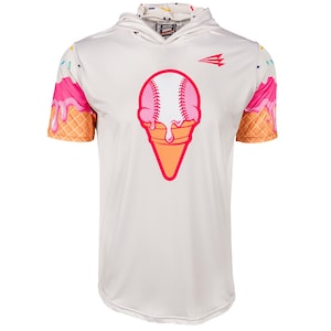 May include: White baseball jersey with a large ice cream cone design. The cone is orange, the ice cream is pink, and the baseball is white with pink stitching. The sleeves have a pink ice cream drip design over a waffle cone pattern.