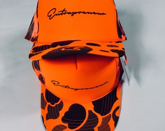 ORANGE “ CAMO “ TRUCKER