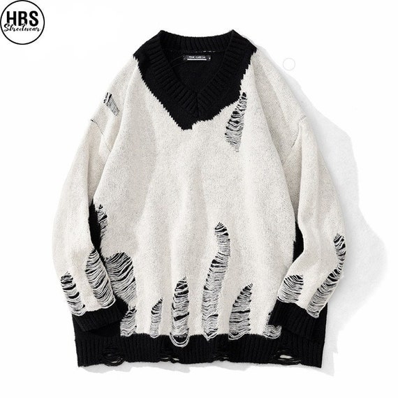https://www.etsy.com/listing/1326904087/black-white-ripped-knit-sweater-hole