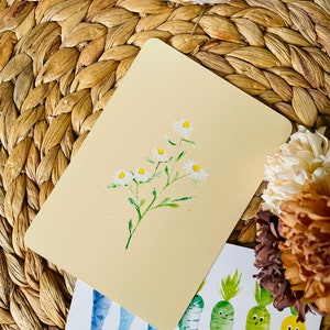 Camomille florale de carte de voeux