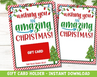 May include: Printable gift card holder with a red and white striped background, a green Christmas tree with lights, and the text "Wishing you an amazing Christmas!"