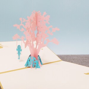 Dessin Girl on a swing from tree, carte pop-up 3D, carte de voeux 3D, carte pop-out, créations en papier, fournitures en papier et carte cadeau