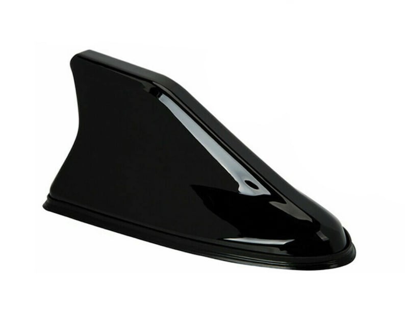 May include: A black car antenna fin, designed to improve aerodynamics and add a sporty look to a vehicle.