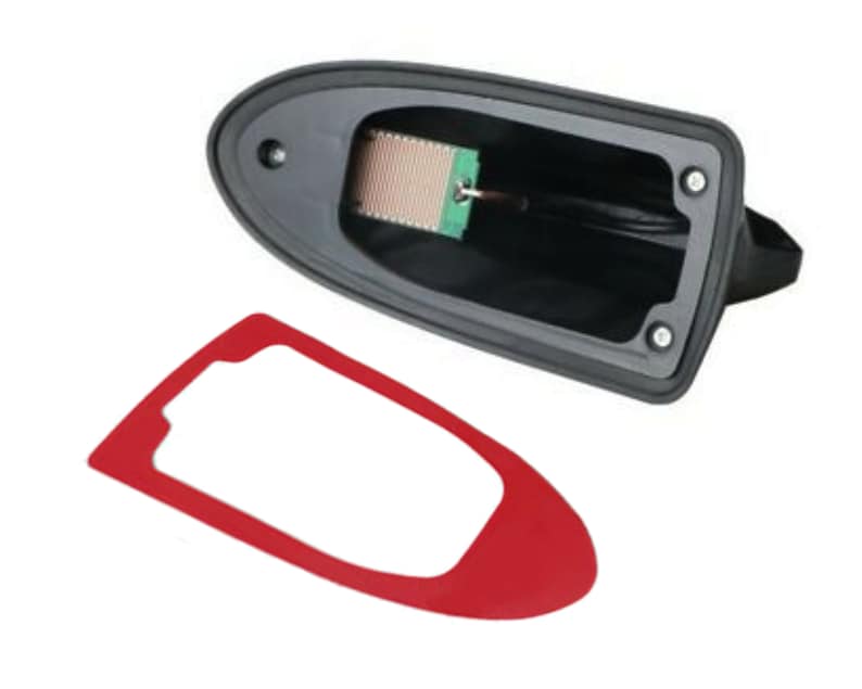 May include: A black shark fin antenna with a red adhesive sticker. The antenna has a small green circuit board inside.