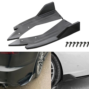 May include: A pair of black carbon fibre rear diffuser spoilers for a car. The spoilers are designed to improve aerodynamics and enhance the car's appearance. The set includes screws for installation.