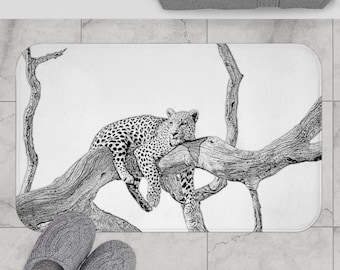 May include: Black and white illustration of a leopard resting on a tree branch. The leopard is drawn in a realistic style, with detailed fur markings. The tree branch is also drawn in detail, with bark and leaves.