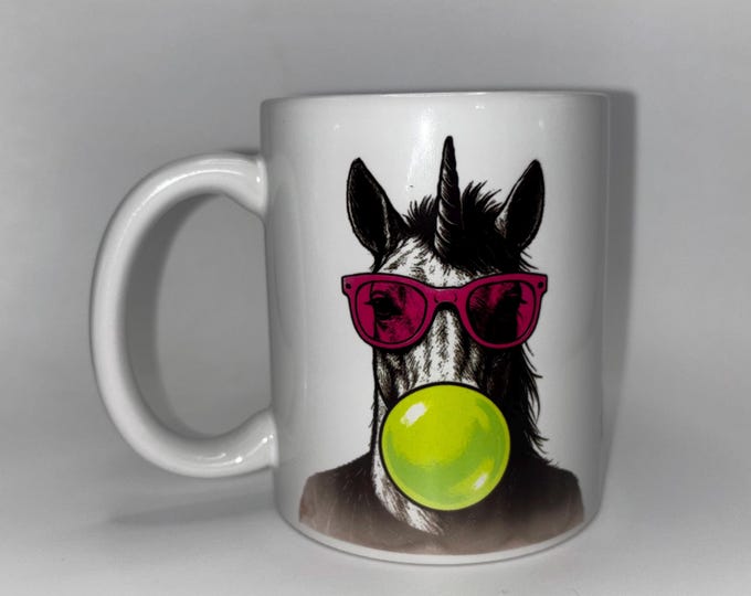 Einhorn in Weiss–Schwarz–Neon  Motivtasse zum verschenken oder sich selbst beschenken.