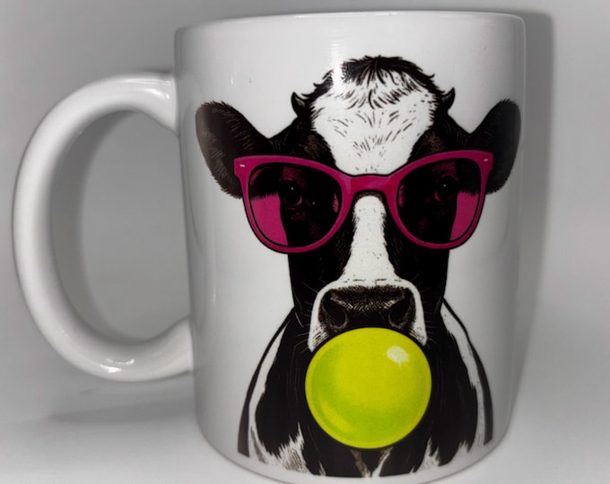 Cow head in white-black-neon motif mug, perfect as a gift or a treat for yourself.