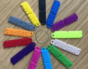 Llavero personalizado con nombre, etiqueta de goma 3D personalizada con nombre, etiqueta para mochila escolar, obsequios para fiestas, relleno para calcetines navideños, llaveros al por mayor