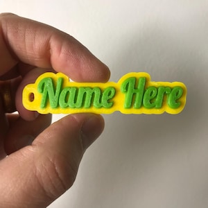 Porte-clés 3D bicolore en caoutchouc personnalisé, porte-clés 3D, contrairement à ceux en plastique, ces étiquettes en caoutchouc ne se cassent pas, parfaites pour toutes les clés !