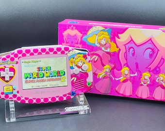 PRINCESA PEACH Gameboy Advance personalizado en color rosa con pantalla IPS retroiluminada, audio mejorado y actualizaciones disponibles.