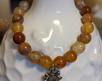 Stretchy bead bracelet, 8mm dyed crackle agate yellow/orange bead, silver sunflower charm, fall colors