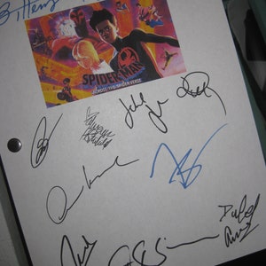 May include: A white sheet of paper with multiple signatures in black ink. The signatures include "Jitterbug", "Karen S", "Julie Greer", "Paul Rust", "Alex", "Jeff Ross", and "Paley Cruz". The paper also features a poster for the movie "Spider-Man: Across the Spider-Verse".