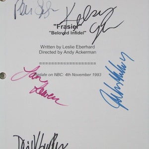 May include: A white sheet of paper with several signatures in black, blue, and pink ink. The signatures are from the cast of the TV show "Frasier". The text "Frasier" and "Beloved Infidel" are written in black ink. The text "Airdate on NBC: 4th November 1993" is written in black ink.